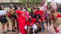 a group of women posing for a photo